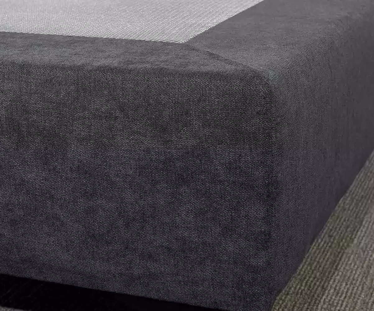 Détail du tissu bleu du sommier tapissier