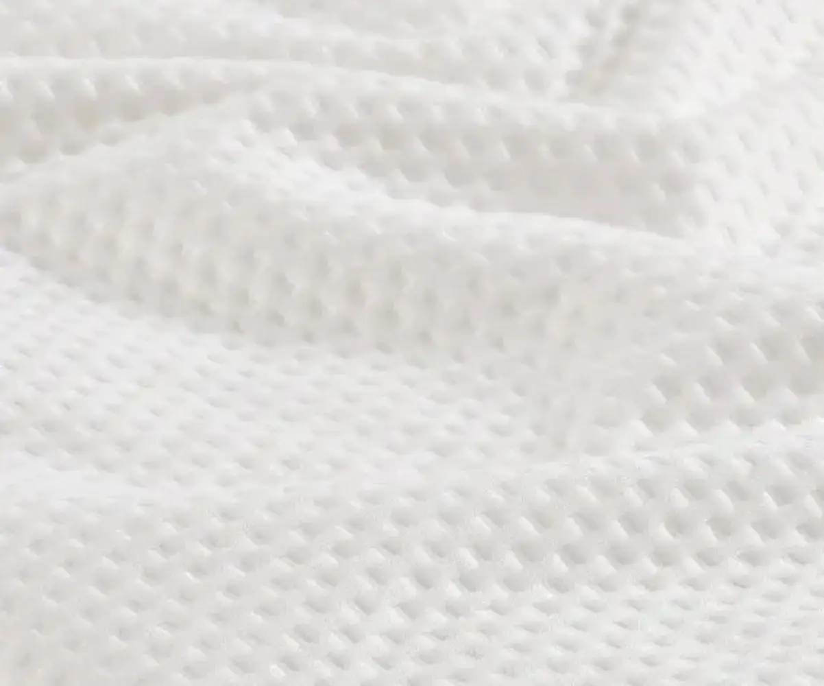 Zoom sur le protège matelas