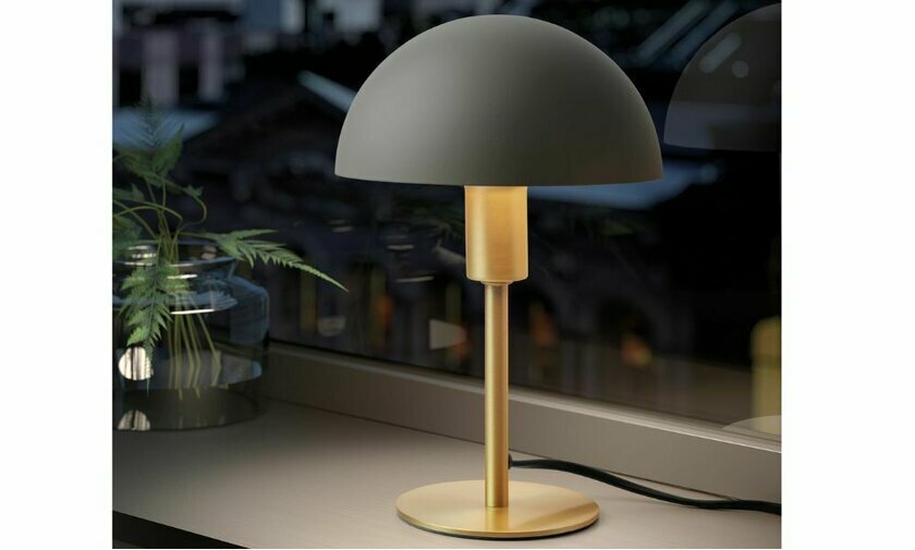 Lampe  Poser Teaupa coloris laiton et noir apporte une touche dlgance dans votre intrieur